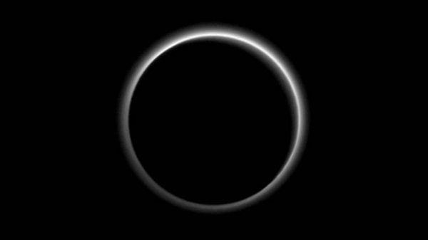 Pluto's atmosphere backlit by Sun