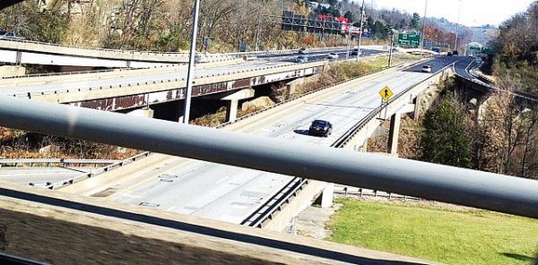 Interstate 70 is reduced to one lane in both directions in the area of Wheeling Tunnel, leading officials of the state Division of Highways to designate the roadways as too dangerous to erect an "Attraction Sign" featuring advertisements for downtown businesses.