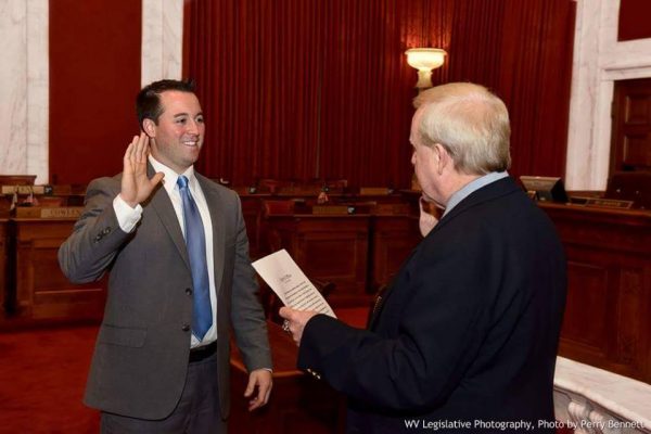 Del. Fluharty was sworn in as a West Virginia lawmaker by former House Clerk Greg Gray.