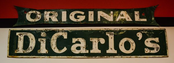 This sign hung for years in downtown Wheeling at a few other locations. Today, it hangs inside the office of the downtown Wheeling store.