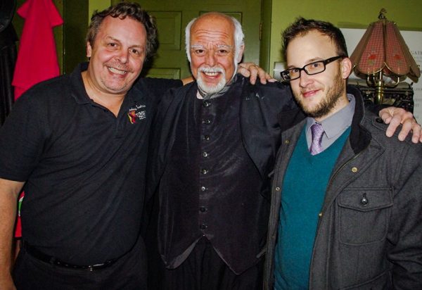 Playwright Jeremy Richter (far right) stands with "A Christmas Carol" director Tim Thompson and lead actor Rob Garrison.