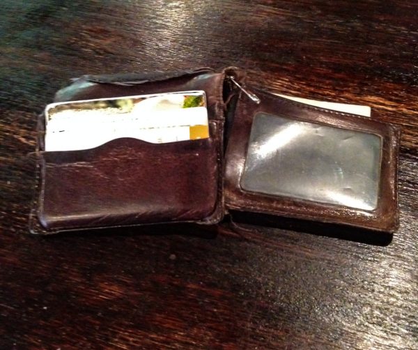 Scatterday's wallet, complete with a safety pin to keep it together.
