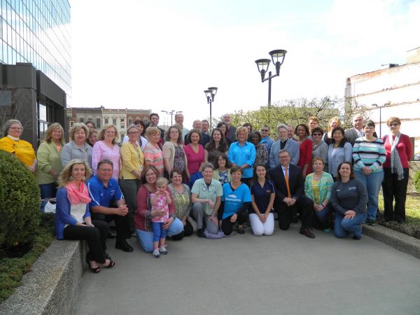 Several employees of participating organizations gathered outside of downtown Wheeling's Wesbanco Bank to discuss this year's "Amazing Raise."
