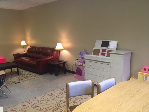 This visitation room inside the Hazel Atlas Building received a makeover thanks to the non-profits teaming up once again.
