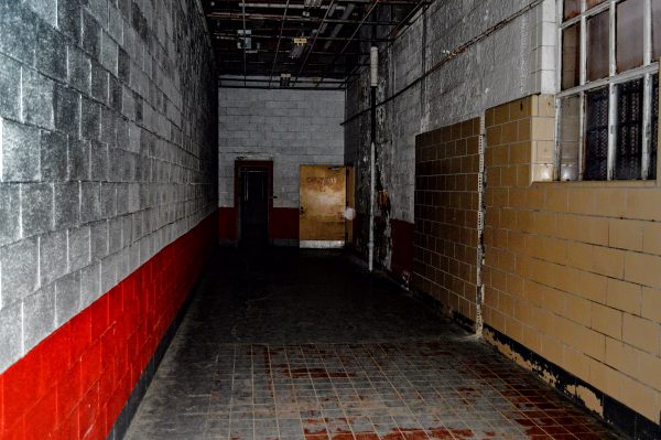 This hallway is where the legendary "Shadow Man" was photographed a few years ago. ... Is that an orb? Because it's not a dusty camera lens.