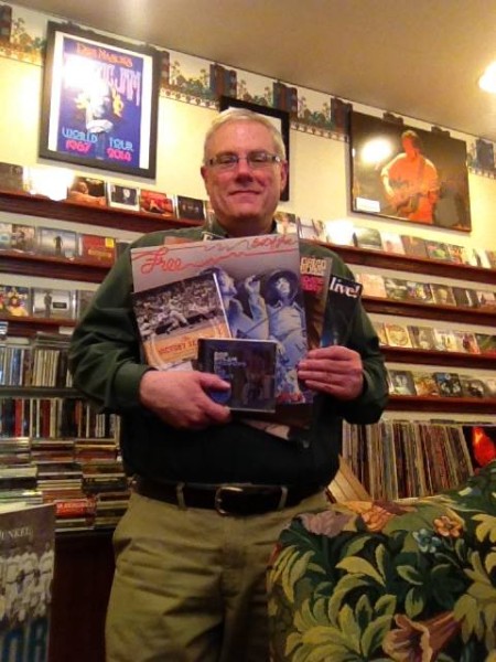 Books & Music owner and operator, Alan Lestini, shows of some of his merchandise. 