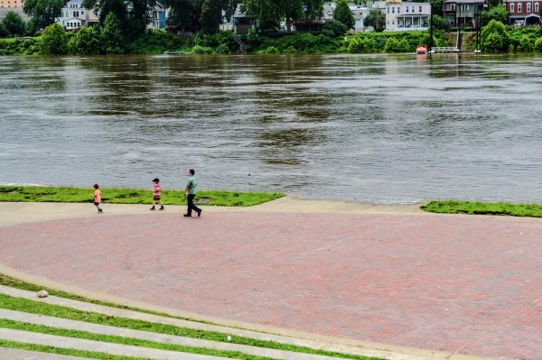 The Ohio River rose over last weekend, covering the lower area of Heritage Port and causing officials of the Multicultural Festival to move its live entertainment to 12th Street.