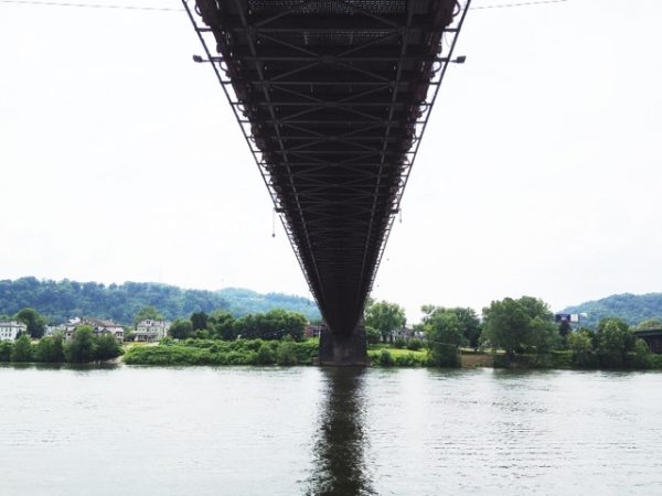 Those utilizing the Wheeling Trails along the Ohio River pass directly under the historic span.