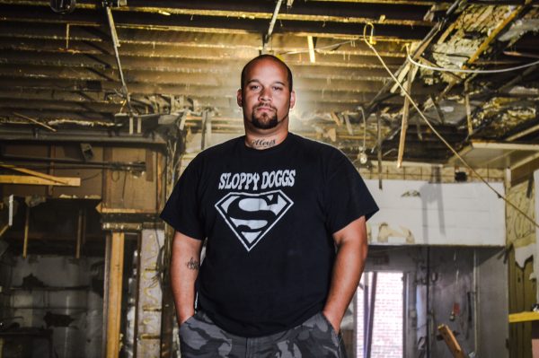 Christopher Burress, owner of Sloppy Dogs in downtown and in the Elm Grove section of Wheeling, plans to consolidate his location inside the former Dinner Bell.
