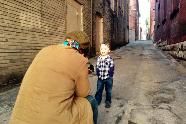 One of the first photos taken during the "Meet Me in the Alley" art project was McKinley's son, Louie.