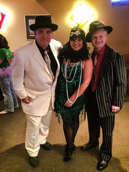 Representatives of the Wheeling Convention and Visitors Bureau - (from left to right) Frank O'Brien, Olivia Litman, and Michael Biela, adopted the Mobster theme for the Governor's Conference Halloween Party at the former West Virginia Pen.