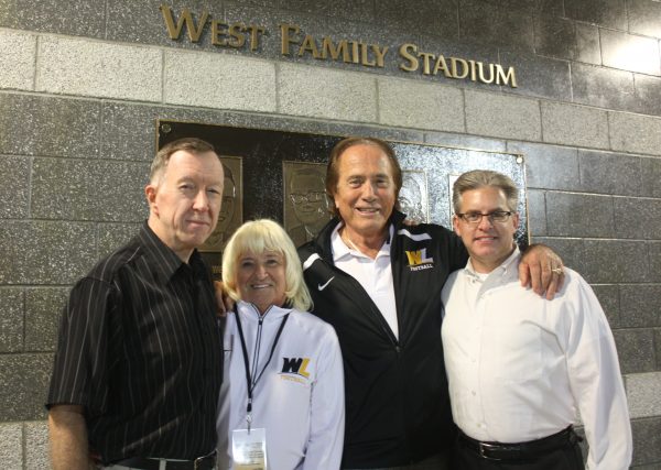 Dr. McCullough meets with Flip and Gary West, and Ron Witt following the dedication ceremony for the West Family Stadium.
