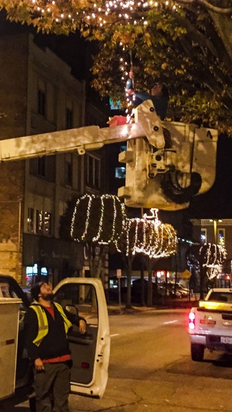 Crews with ERB Electric worked during the evening hours in downtown Wheeling the past two weeks to place lights on 81 trees along Main and Market streets.