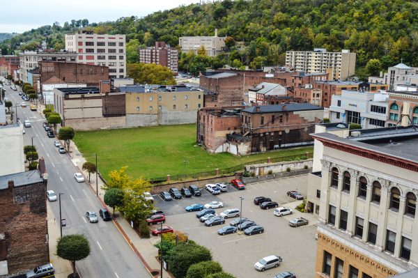 The last two standing buildings in the 1100 block of downtown Wheeling will be soon razed to make way for The Health Plan's new headquarters.