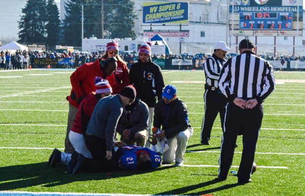 His separated shoulder was returned to its socket on the turf of Wheeling Island Stadium.