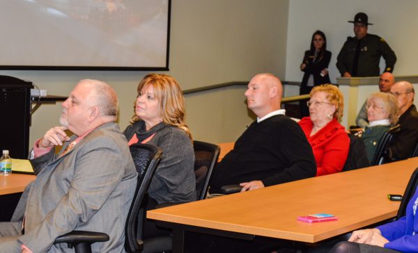 Council members (from left) Don Atkinson (with his wife, Gail, seated next to him), Ken Imer, Gloria Delbrugge, and Robert "Herk" Henry attended The Health Plan's press conference in the Stone Center.