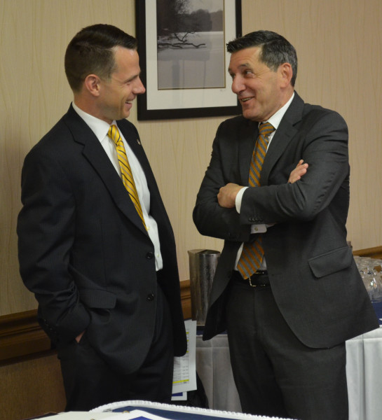 U.S. Attorney Bill Ihlenfeld discussing the drug epidemic with White House Office of National Drug Control Policy Director Michael Botticelli at a June 2015 Prescriber Education Conference designed by our office.