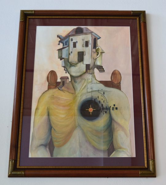 This Carney creation features a man with a compass for a heart and a house for his head.