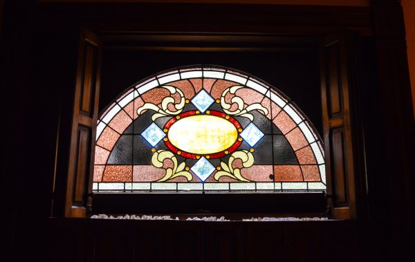 The "signature window," according to Joe Figaretti, shines brightly inside a second-floor bedroom.