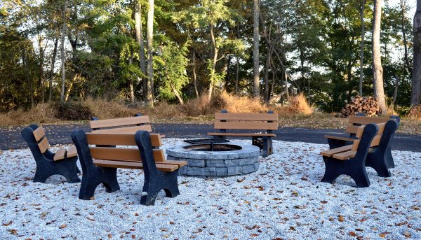 A community fire pit was installed for the occupants of the four treehouse cabins and Grand Vue Park supplies the wood.