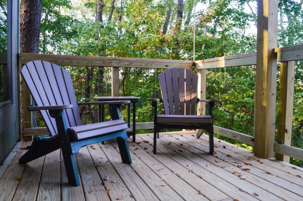 Each of the new cabins offers a deck that sits among the trees at Grand Vue Park. 