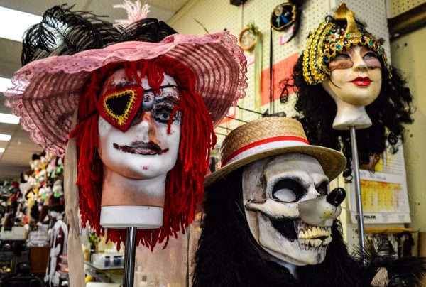 The costume shop shop offers masks and makeup to fit a customer's wish.