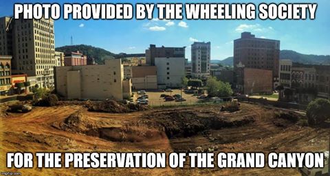 Preservation is playing a big role in the revitalization of downtown Wheeling but the eartwork on the Health Plan's construction site lent itself to this image and coinciding satirical story.
