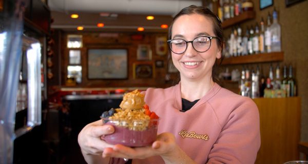 Sami of LaBowls showing off an acai bowl creation.